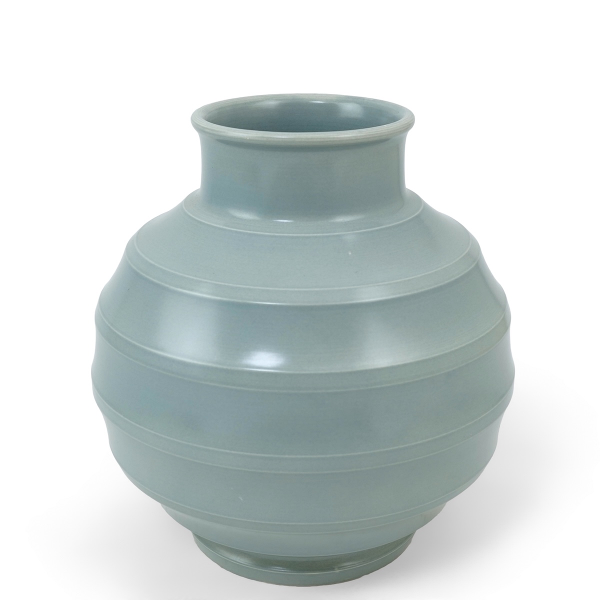 Keith Murray MC RDI FRIBA (New Zealand/British, 1892-1981) for Wedgwood: A pale blue glazed globe or 'bomb' vase